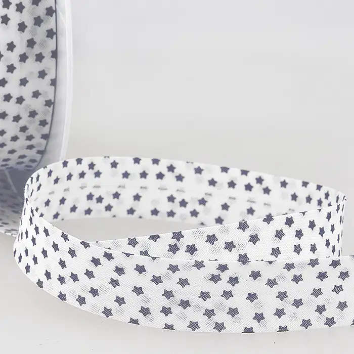 Biais replie Etoiles blanc 20mm au mètre Biais replie Etoiles blanc 20mm au mètre