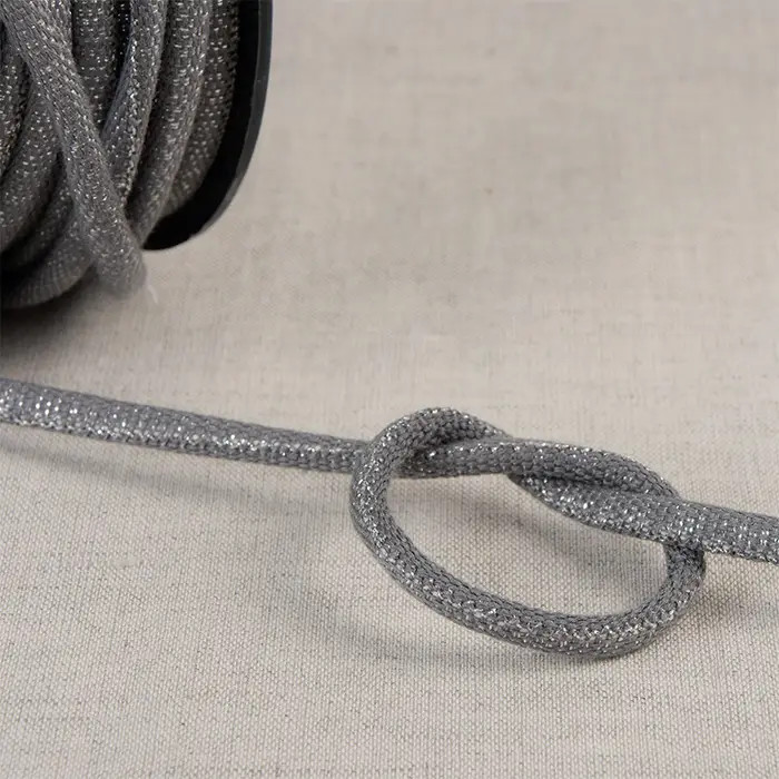 Cordon tressé rond métallisé gris-argenté 6mm Cordon tressé rond métallisé gris-argenté 6mm