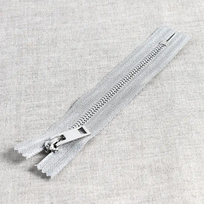 Fermeture à glissière non séparable lurex 20cm - Argent Fermeture à glissière non séparable lurex 20cm - Argent